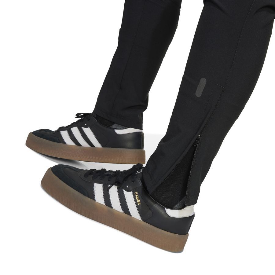Manchester United Training Trousers Tiro 25 Competition Vis Tech Travel - Black/Purple Rush Kids-SoccerKits Hub | Buy Soccer Jerseys Online